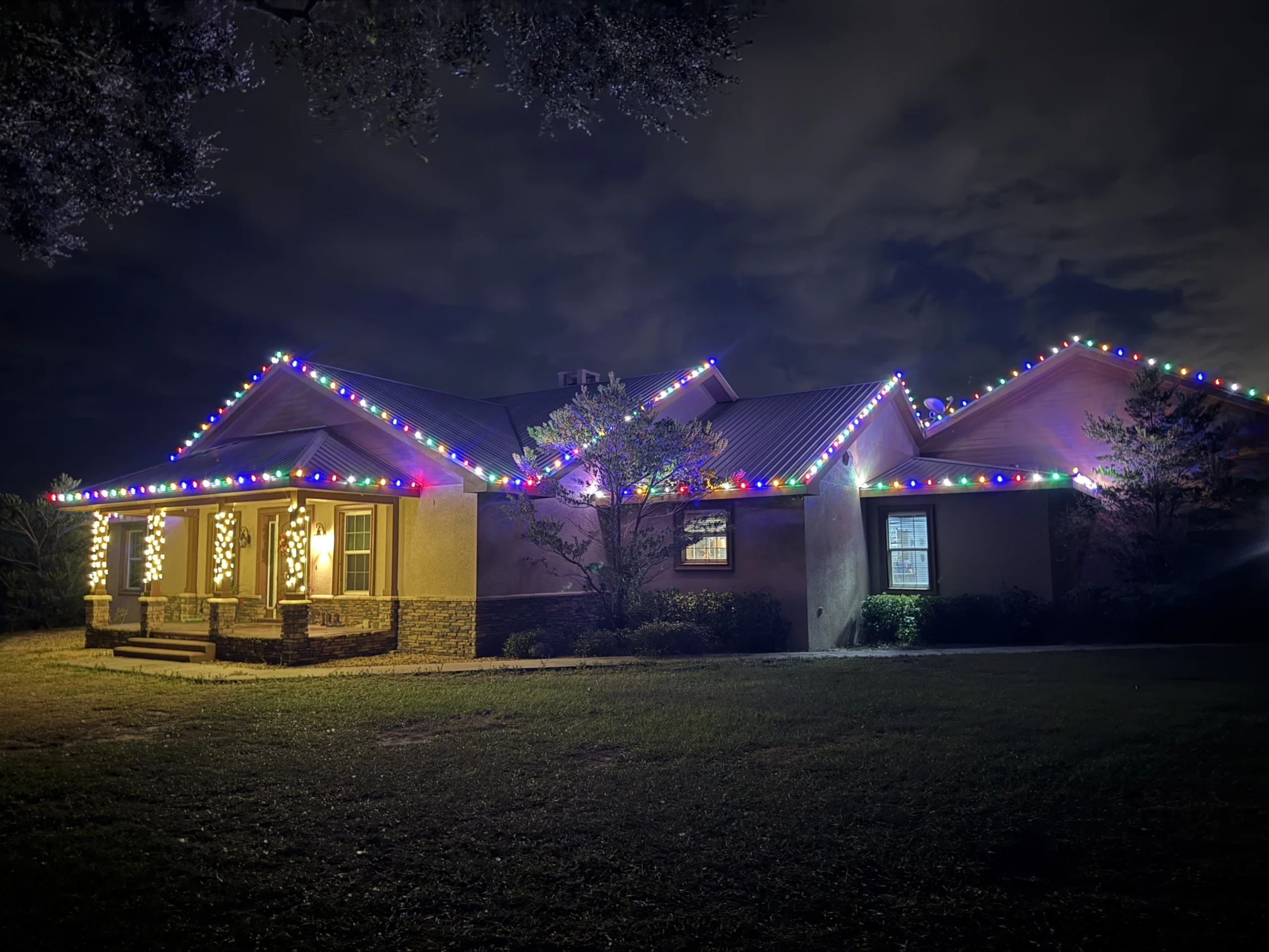 Residential Christmas light installation in Orlando FL by Light The Peak